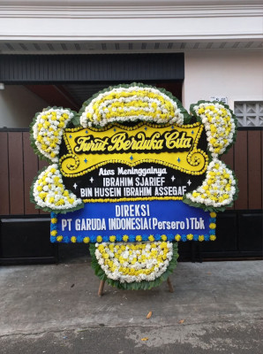 Papan Bunga Duka di Dringo